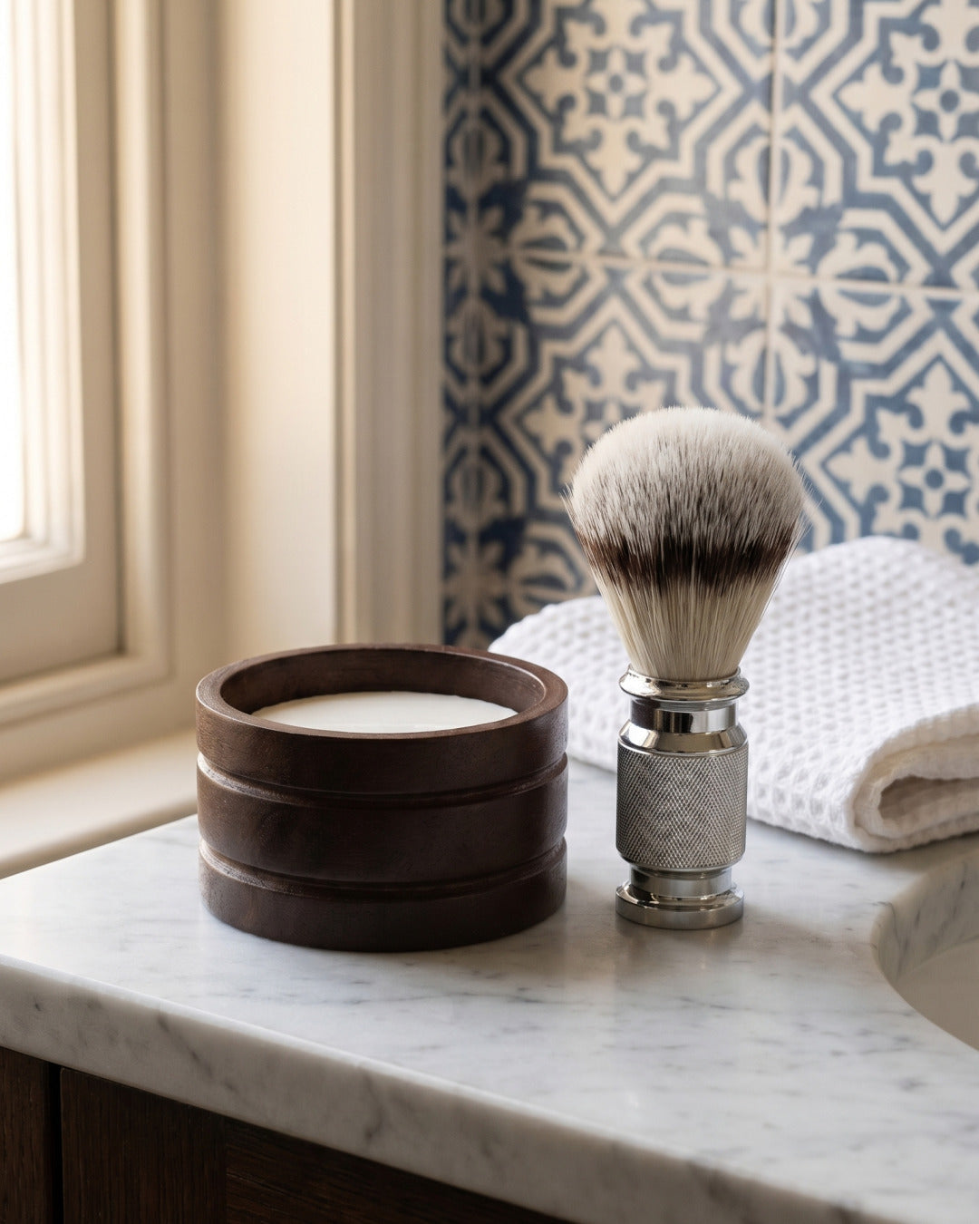 Kronos wooden shaving bowl, sandalwood soap and shaving brush in a bathroom
