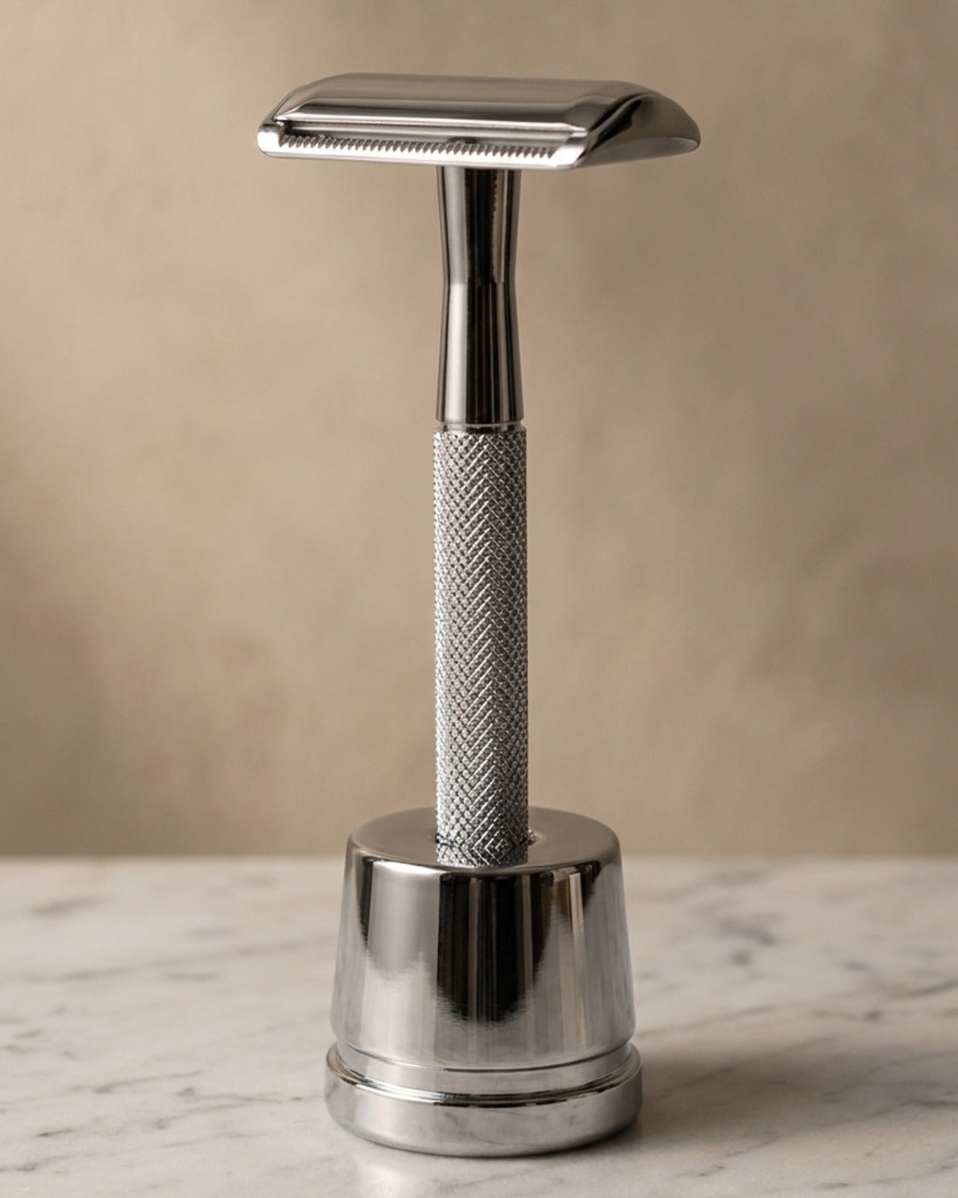 Kronos safety razor in chrome with stand, studio still