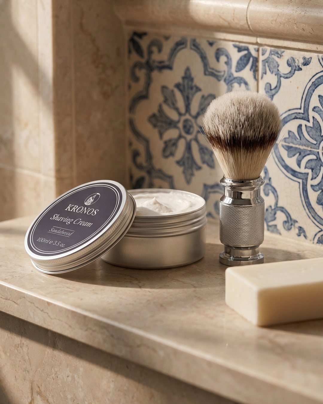 Kronos sandalwood shaving cream and shaving brush in a bathroom