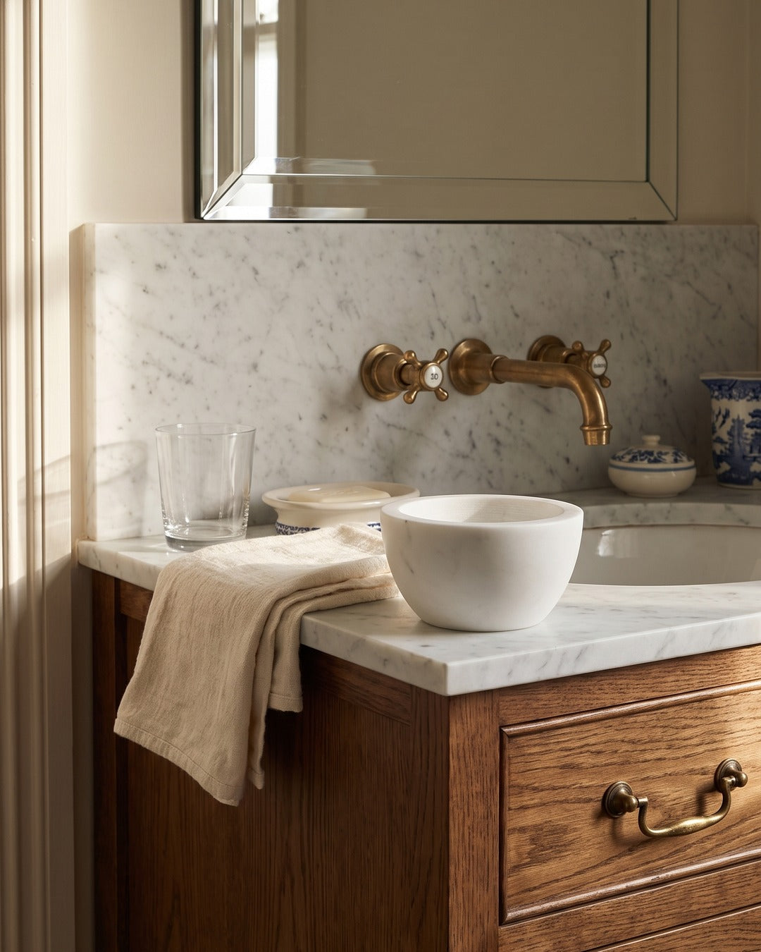 Kronos marble shaving bowl on a marble washstand in a traditional British bathroom