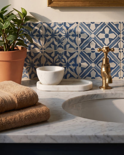 Kronos marble shaving bowl and storage tray on a marble basin surround